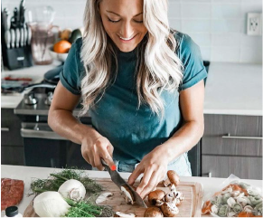 Alexandra B., customer testimonial photo showing her preparing meals