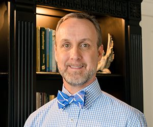 Anita & Lou S., customer testimonial photo with Chef Ami delivery box